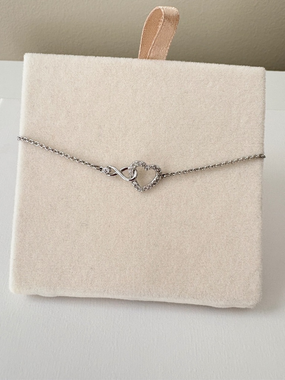 Swarovski Infinity Heart Adjustable Bolo Bracelet in Rhodium Tone